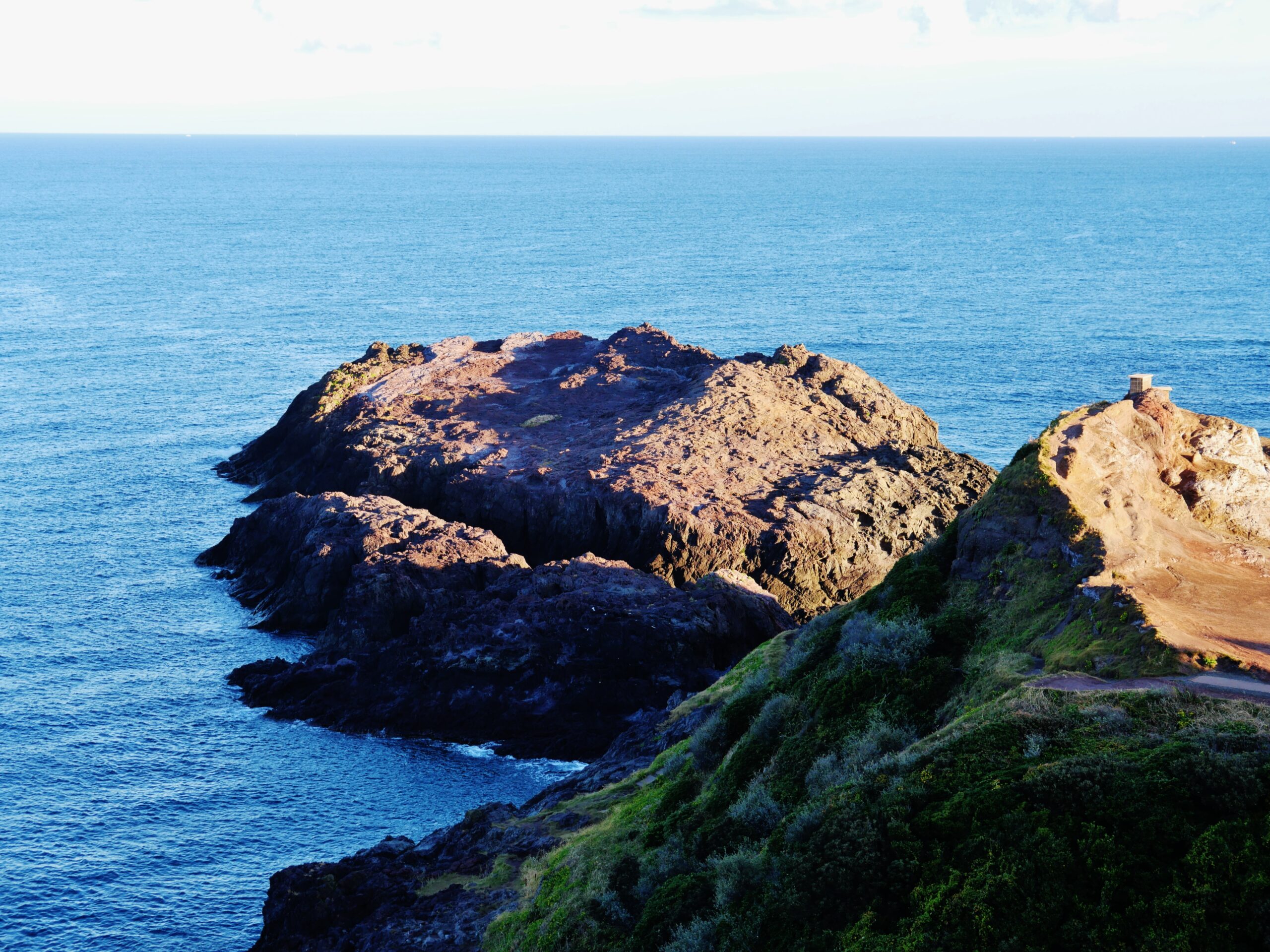 Rocky coastline near Motonosumi Shrine with the deep blue Sea of Japan