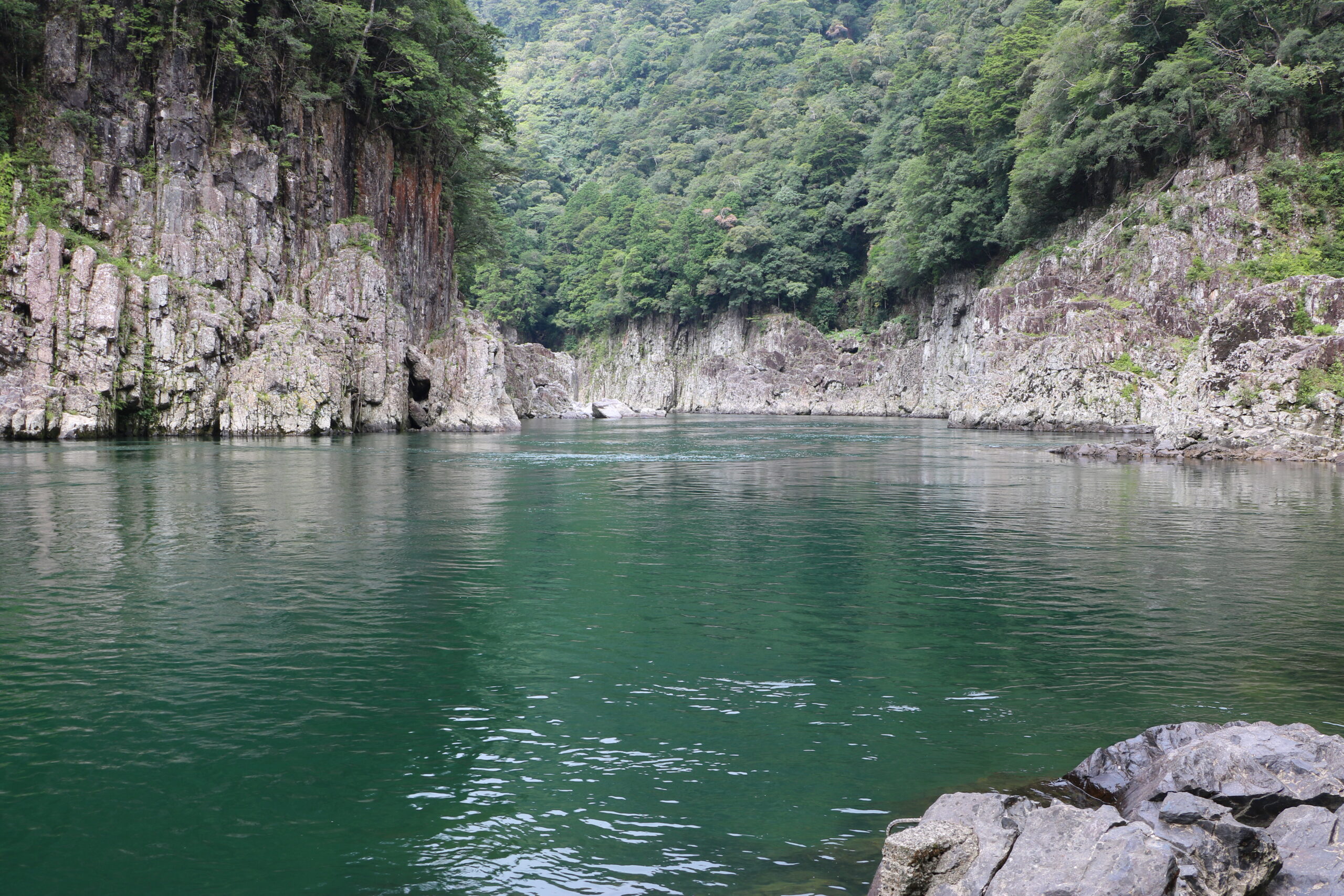The still summer water and rock walls of Dorokyo
